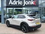 Mazda CX-30 2.0 e-SkyActiv-X M Hybrid Luxury | AUTOMAAT | GARANTIE 4/2029 | APPLE + ANDROID AUTO | STOEL + STUUR VERWARMING | LEDER | ELEKT.A ACHTERKLEP | 1e EIGENAAR | NED. AUTO | Bose AUDIO |