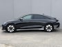 Hyundai Ioniq 6 Connect 77.4 kWh / SOH 100% / Fabrieksgarantie tot 12-2029 / HUD / Adaptieve Cruise / Warmtepomp / Navigatie / Camera  / Dodehoek Detectie / Elektr. Stoel / Elektr. Achterklep / Stoel & Stuurwiel Verwarming / CCS Snelladen /