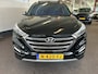 Hyundai Tucson 1.6 T-GDi Premium 4WD Automaat | Panoramadak | Inklapbare trekhaak | Lederen bekleding | Cruise control | Stoelverwarming+verkoeling | Achteruitrijcamera | Lane assist | Dodehoeksdetectie | Stuurverwarming