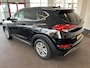Hyundai Tucson 1.6 T-GDi Premium 4WD Automaat | Panoramadak | Inklapbare trekhaak | Lederen bekleding | Cruise control | Stoelverwarming+verkoeling | Achteruitrijcamera | Lane assist | Dodehoeksdetectie | Stuurverwarming