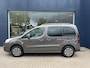 Peugeot Partner Tepee 1.2 Turbo 110PK Active | Uniek lage km stand: 38500 | Navigatie | Apple Carplay / Android Auto | Airco | Camera | Ruime Gezinsauto | 2x Zijschuifdeur | Uitneembare Stoelen | All Season Banden | Parkeersensoren | Dakrails |