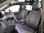 Volkswagen Tiguan 1.5 eHybrid R-Line Edition 272 pk Automaat (DSG) | Verlengde garantie | Navigatie | Panoramadak | Trekhaak (wegklapbaar) | Parkeersensoren (Park assist) | Rondomzicht camera| Lederen bekleding | Stoelverwarming v/a | R-Line |