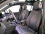 Volkswagen Tiguan 1.5 eHybrid R-Line Edition 272 pk Automaat (DSG) | Verlengde garantie | Navigatie | Panoramadak | Trekhaak (wegklapbaar) | Parkeersensoren (Park assist) | Rondomzicht camera| Lederen bekleding | Stoelverwarming v/a | R-Line |