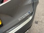 Toyota Corolla 1.8 Hybrid Dynamic Automaat (APPLE CARPLAY, LEDER, STOELVERWARMING, CAMERA, SPORTSTOELEN, ADAPTIVE CRUISE, GETINT GLAS, ZWART HEMEL, NIEUWSTAAT)