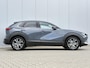 Mazda CX-30 2.0 e-SkyActiv-X M Hybrid Luxury / Elektrisch Glazen Schuif-/kanteldak / Navigatie Full map / Trekhaak 1300 kg geremd / Lederen Bekleding /
