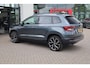 Skoda Karoq 1.0 TSI Ambition Business achetruitrijcamera, privacy glas, 19''LMV, pdc voor en achter, navigatie, climatronic, licht en regensensoren, mistlampen