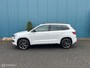 Skoda Karoq 1.5 TSI DSG AUT. Sportline Business PANO | CANTON.AUDIO | CARPLAY | TREKH.ELEK | STUUR/STOELVERW | DIGI.DASHB | ADAPT.CRUISE | CAM | LED | NAV | PDC | LMV