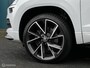 Skoda Karoq 1.5 TSI DSG AUT. Sportline Business PANO | CANTON.AUDIO | CARPLAY | TREKH.ELEK | STUUR/STOELVERW | DIGI.DASHB | ADAPT.CRUISE | CAM | LED | NAV | PDC | LMV