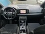 Skoda Karoq 1.5 TSI DSG AUT. Sportline Business PANO | CANTON.AUDIO | CARPLAY | TREKH.ELEK | STUUR/STOELVERW | DIGI.DASHB | ADAPT.CRUISE | CAM | LED | NAV | PDC | LMV