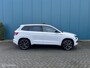 Skoda Karoq 1.5 TSI DSG AUT. Sportline Business PANO | CANTON.AUDIO | CARPLAY | TREKH.ELEK | STUUR/STOELVERW | DIGI.DASHB | ADAPT.CRUISE | CAM | LED | NAV | PDC | LMV