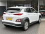 Hyundai Kona Electric EV Fashion 64 kWh | 94,7% SOH | Trekhaak | Warmtepomp | Head-Up | 3Fase | Krell | Dodehoeksensoren | Camera |