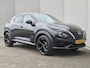 Nissan Juke 1.6 Hybrid Tekna / Fabrieksgarantie tot 05-2028<100.000 / Stuur- & Stoelverwarming / Bose Audio Systeem / Rondomzicht camera / Adaptief cruise control / Draadloze telefoon lader / Apple Carplay Android Auto / Keyless