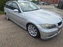 BMW 3-Serie Touring 320i High Executive differentieel hoorbaar