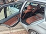 BMW 3-Serie Touring 320i High Executive differentieel hoorbaar