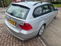 BMW 3-Serie Touring 320i High Executive differentieel hoorbaar