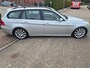 BMW 3-Serie Touring 320i High Executive differentieel hoorbaar
