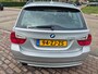 BMW 3-Serie Touring 320i High Executive differentieel hoorbaar