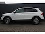 Volkswagen Tiguan 1.4 TSI eHybrid R-Line Business+ | Incl. 12 Maanden garantie | Stoelverwarming | Stuurverwarming | Adaptieve cruise | Apple Carplay/Android Auto | Memory seats | Navigatie | Parkeersensoren | Parkeercamera | Trekhaak |