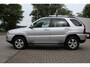 Kia Sportage 2.0 CVVT X-clusive | Airco | Cruise control | Navigatie | APK |