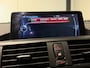 BMW 1-Serie 118i High Executive (PANO, LED, STOELVERWARMING, GROOT NAVI, PARKEERSENSOREN)