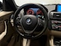 BMW 1-Serie 118i High Executive (PANO, LED, STOELVERWARMING, GROOT NAVI, PARKEERSENSOREN)
