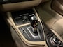 BMW 1-Serie 118i High Executive (PANO, LED, STOELVERWARMING, GROOT NAVI, PARKEERSENSOREN)