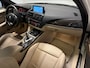 BMW 1-Serie 118i High Executive (PANO, LED, STOELVERWARMING, GROOT NAVI, PARKEERSENSOREN)