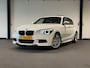BMW 1-Serie 118i High Executive (PANO, LED, STOELVERWARMING, GROOT NAVI, PARKEERSENSOREN)