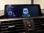 BMW 1-Serie 118i High Executive (PANO, LED, STOELVERWARMING, GROOT NAVI, PARKEERSENSOREN)