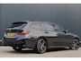 BMW 3-Serie Touring 320e | M Sport LCI | Dravitgrau | Leer / Alcantara | Trekhaak afn. | 19 Inch | Stoelverwarming | Live Cockpit Plus | M-Pakket