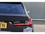 BMW 3-Serie Touring 320e | M Sport LCI | Dravitgrau | Leer / Alcantara | Trekhaak afn. | 19 Inch | Stoelverwarming | Live Cockpit Plus | M-Pakket