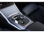 BMW 3-Serie Touring 320e | M Sport LCI | Dravitgrau | Leer / Alcantara | Trekhaak afn. | 19 Inch | Stoelverwarming | Live Cockpit Plus | M-Pakket