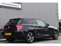 BMW 1-Serie 116i Business+ Cruise, PDC, M-sport stuur, Sport stoelen Leder, Rode Gordels, NL-auto