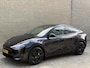 Tesla Model Y Long Range 75 kWh AWD | Lederen bekleding | Trekhaak afneembaar | Autopilot | Panoramadak | Camera | Memory | Elektrische achterklep | Stoel&stuurverwarming | Full-LED | DAB | Keyless | Dodehoekdetectie | Navigatie | 19 inch velgen