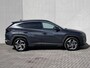 Hyundai Tucson 1.6 T-GDI PHEV Premium 4WD / Fabrieksgarantie tot 03-2027 / Afn. trekhaak 1.350 kg / Camera 360° / Stoelventilatie / Stuur-, stoel- en achterbankverwarming / Navigatie / Apple Carplay Android / 19" LM wielen /