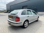 Skoda Fabia Combi 1.4-16V Comfort | CRUISE | ELEKTRISCHE RAMEN | AIRCO | TREKHAAK | SCHUIF/KANTELDAK | DAKRAILS | NL AUTO | NAP
