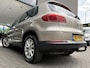 Volkswagen Tiguan 1.4 TSI R-Line Edition Airco - Apple carplay - Achteruitrijcamera - Parkeersensoren - Navigatie - Cruise control - Trekhaak - Dakrails - Led verlichting - Dakspoiler - Licht metalen velgen 18 inch - Stuur multifun - Start/stop systeem - Radio - Bluetooth - mistlampen voor