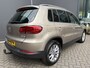 Volkswagen Tiguan 1.4 TSI R-Line Edition Airco - Apple carplay - Achteruitrijcamera - Parkeersensoren - Navigatie - Cruise control - Trekhaak - Dakrails - Led verlichting - Dakspoiler - Licht metalen velgen 18 inch - Stuur multifun - Start/stop systeem - Radio - Bluetooth - mistlampen voor
