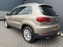 Volkswagen Tiguan 1.4 TSI R-Line Edition Airco - Apple carplay - Achteruitrijcamera - Parkeersensoren - Navigatie - Cruise control - Trekhaak - Dakrails - Led verlichting - Dakspoiler - Licht metalen velgen 18 inch - Stuur multifun - Start/stop systeem - Radio - Bluetooth - mistlampen voor