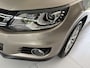 Volkswagen Tiguan 1.4 TSI R-Line Edition Airco - Apple carplay - Achteruitrijcamera - Parkeersensoren - Navigatie - Cruise control - Trekhaak - Dakrails - Led verlichting - Dakspoiler - Licht metalen velgen 18 inch - Stuur multifun - Start/stop systeem - Radio - Bluetooth - mistlampen voor