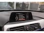 BMW 3-Serie Touring 318i Centennial Executive M-sport | 2e eigenaar | HiFi audio | Navigatie | Bluetooth | Climate control | M-sportstuur | Cruise control | PDC | 18 inch | Trekhaak
