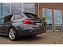 BMW 3-Serie Touring 318i Centennial Executive M-sport | 2e eigenaar | HiFi audio | Navigatie | Bluetooth | Climate control | M-sportstuur | Cruise control | PDC | 18 inch | Trekhaak