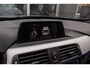 BMW 3-Serie Touring 318i Centennial Executive M-sport | 2e eigenaar | HiFi audio | Navigatie | Bluetooth | Climate control | M-sportstuur | Cruise control | PDC | 18 inch | Trekhaak