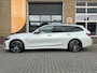 BMW 3-Serie 320e TOURING HIGH EXECUTIVE M-SPORT PANO/LEER/LED/CAMERA/NL-AUTO