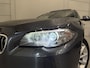 BMW 5-Serie Touring 520d High Exe PANO/LED/TREKHAAK/ZWART LEER/18"/NAVI-GROOT/ECC/CRUISE/STOELVERWARMING/PRIVACY/MINERALGRAU/PERFECT ONDERHOUDEN MET VOLLEDIGE HISTORIE/EURO 6