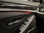 BMW 5-Serie Touring 520d High Exe PANO/LED/TREKHAAK/ZWART LEER/18"/NAVI-GROOT/ECC/CRUISE/STOELVERWARMING/PRIVACY/MINERALGRAU/PERFECT ONDERHOUDEN MET VOLLEDIGE HISTORIE/EURO 6