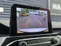 Ford Kuga 2.5 PHEV ST-Line X | Elektrische trekhaak | B&O | Elektrische kofferklep | Stoelverwarming (voor/achter) | Adaptive Cruise Control | Head-Up Display | Parkeercamera/-sensoren | Keyless Entry/Start | Climate Control | BLIS | Draadloze telefoonlader |