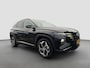 Hyundai Tucson 1.6 T-GDI 265pk PHEV Premium 4WD | Leder | Carplay | Climate | Trekhaak | Navigatie | Elek. Klep | Full - Led | 360 Camera | KRELL Audio | Elek. Stoelen | 19" Lichtmetaal | Winterpakket | Stoelventilatie | Dodehoek Detectie