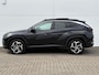 Hyundai Tucson 1.6 T-GDI PHEV Premium Sky 4WD / Trekhaak ( 1350 kg ) / Achterbank verwarmd / Stoel verkoeling en verwarming voor / Elektrisch glazen panorama-dak /