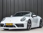 Porsche 911 Cabrio 3.0 Carrera 4 S NL-Auto 451pk | Sport design pack | Achteras besturing | Lift systeem | Sport chrono | 18-wegs memory seats | Burmester sound | Adaptive cruise | Carbon pack | Matrix led | 360 camera | Nw prijs 236.000